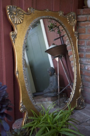 SOLD

large ornately framed oval mirror
36" wide x 48" high