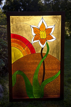SOLD

large vintage framed stained glass window. 23"W x 37.5"H. has hooks at top to hang.