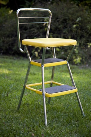 SOLD

vintage cosco yellow vinyl and chrome kitchen step stool chair with fold up seat
in very good condition.